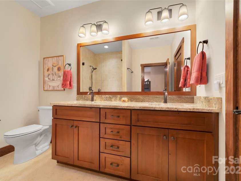 1291 Indian Camp Mountain Road, Rosman, NC 28772.  MLS# CAR4282700, YatesRealty ID 5056. Lower level bath