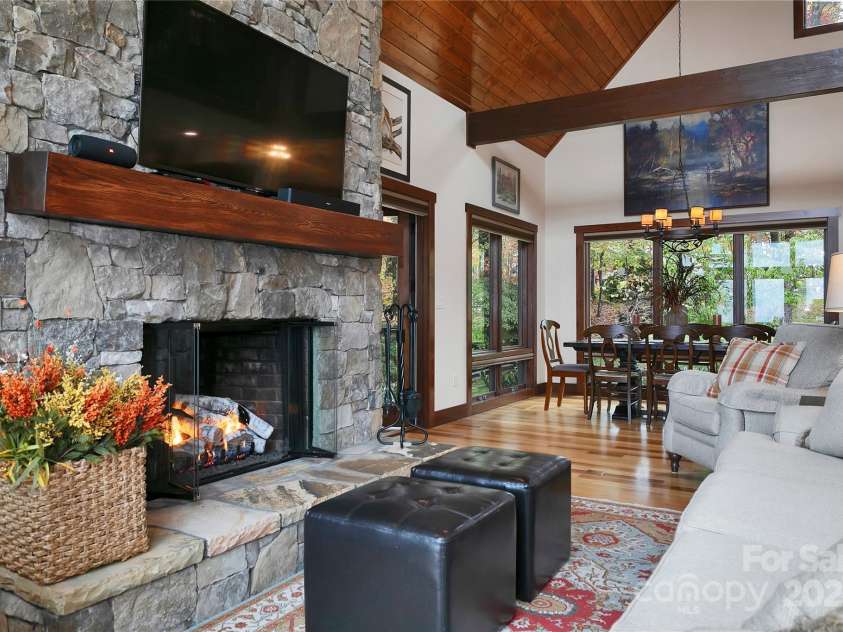1291 Indian Camp Mountain Road, Rosman, NC 28772.  MLS# CAR4282700, YatesRealty ID 5056. Stone fireplace