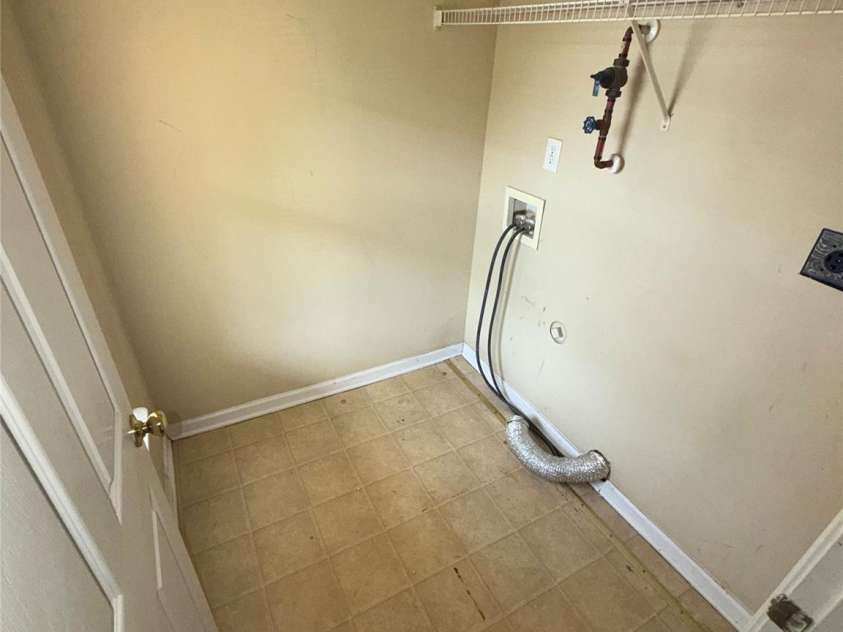 2412 Smugglers Court, Charlotte, NC 28216.  MLS# CAR4424095, YatesRealty ID 50571. Laundry Room