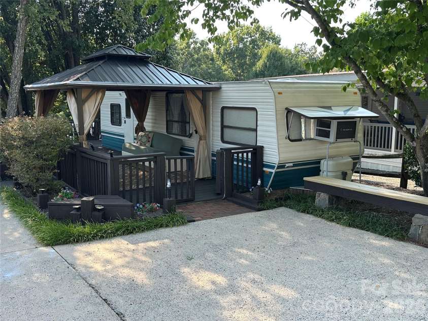 142 Cardinal Avenue, New London, NC 28127.  MLS# CAR4422623, YatesRealty ID 50585. 