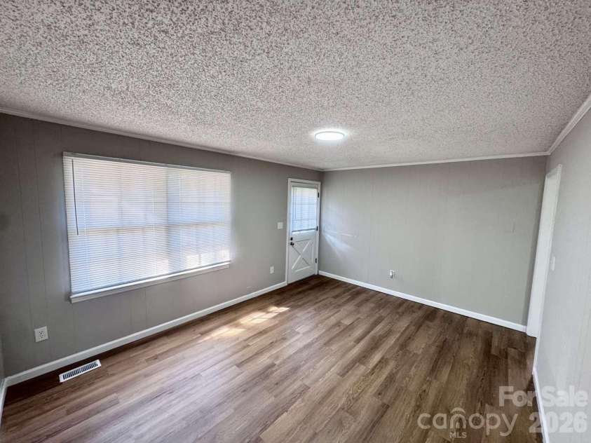 99 Mcginnis Place, Mount Holly, NC 28120.  MLS# CAR4424141, YatesRealty ID 50589. 