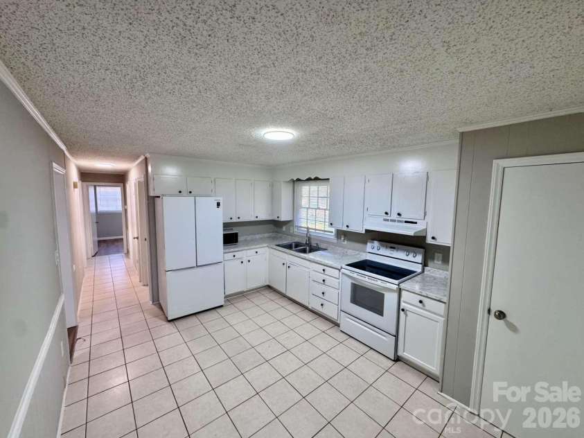 99 Mcginnis Place, Mount Holly, NC 28120.  MLS# CAR4424141, YatesRealty ID 50589. 