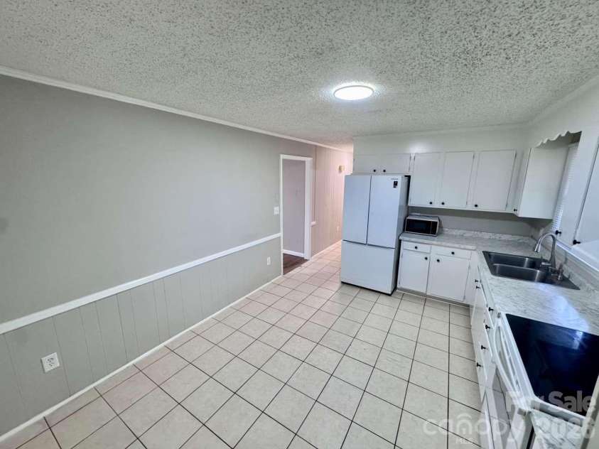 99 Mcginnis Place, Mount Holly, NC 28120.  MLS# CAR4424141, YatesRealty ID 50589. 