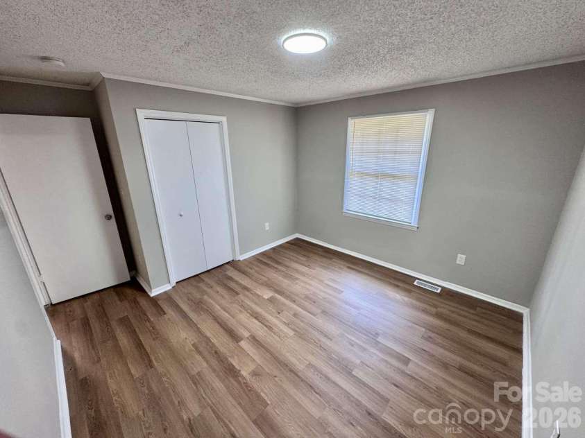99 Mcginnis Place, Mount Holly, NC 28120.  MLS# CAR4424141, YatesRealty ID 50589. 