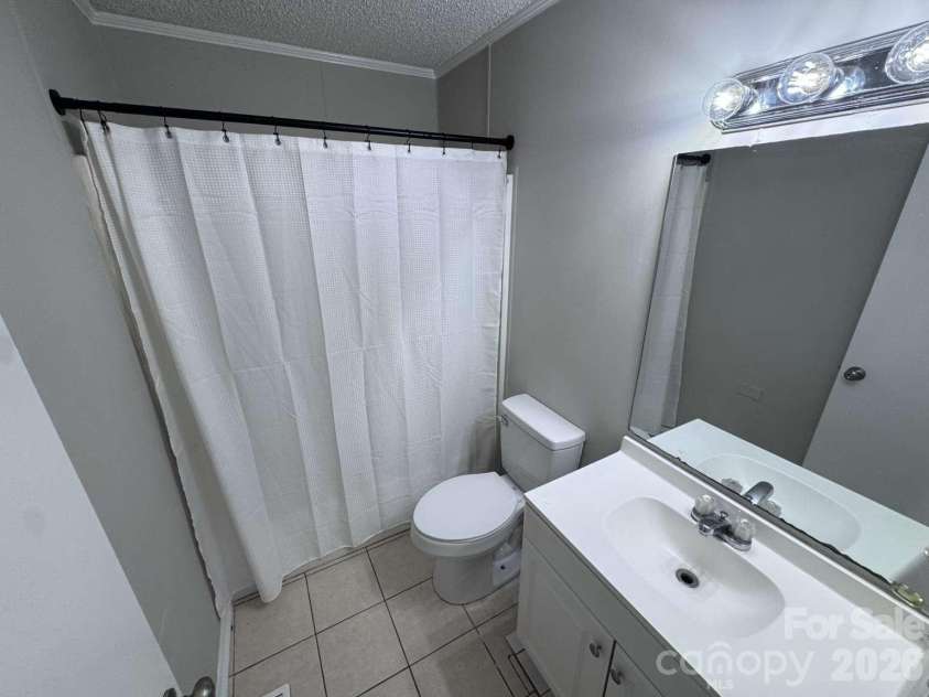 99 Mcginnis Place, Mount Holly, NC 28120.  MLS# CAR4424141, YatesRealty ID 50589. 