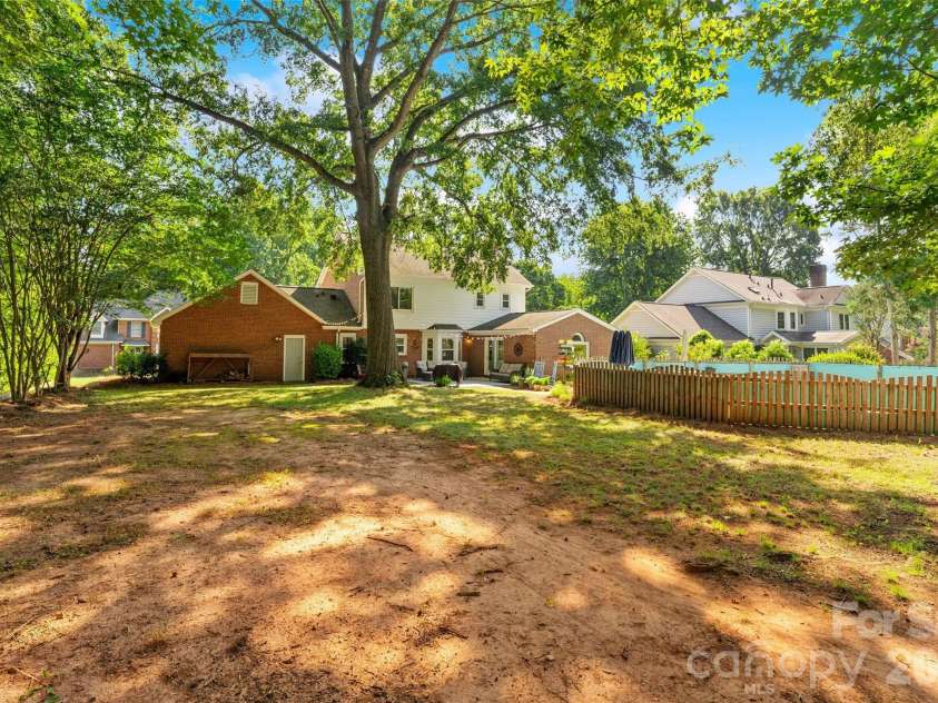 2010 Glendalough Lane, Matthews, NC 28105.  MLS# CAR4422535, YatesRealty ID 50595. Back Yard