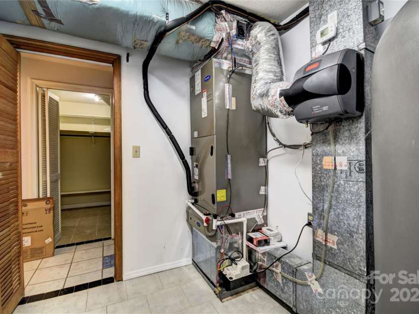 119 Pleasant Hill Circle, Waynesville, NC 28786.  MLS# CAR4325217, YatesRealty ID 506. HVAC system in the mechanical room
