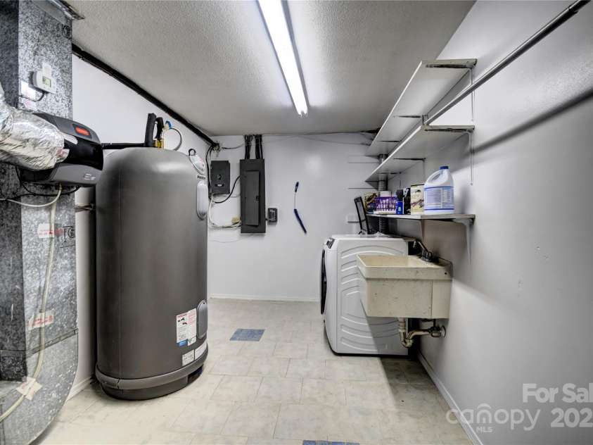 119 Pleasant Hill Circle, Waynesville, NC 28786.  MLS# CAR4325217, YatesRealty ID 506. Laundry and Mechanical room in the basement level- also the mechanical room