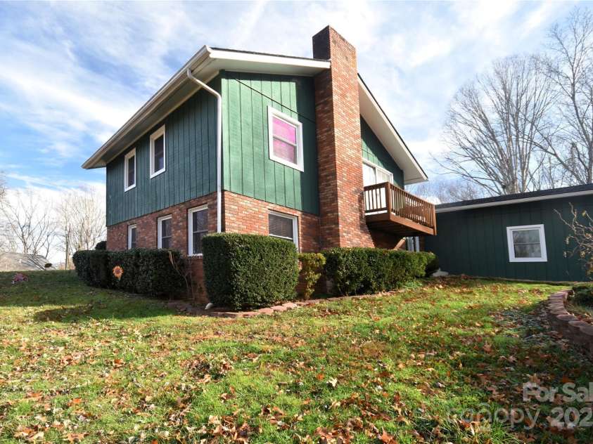 119 Pleasant Hill Circle, Waynesville, NC 28786.  MLS# CAR4325217, YatesRealty ID 506. Lower view from the street