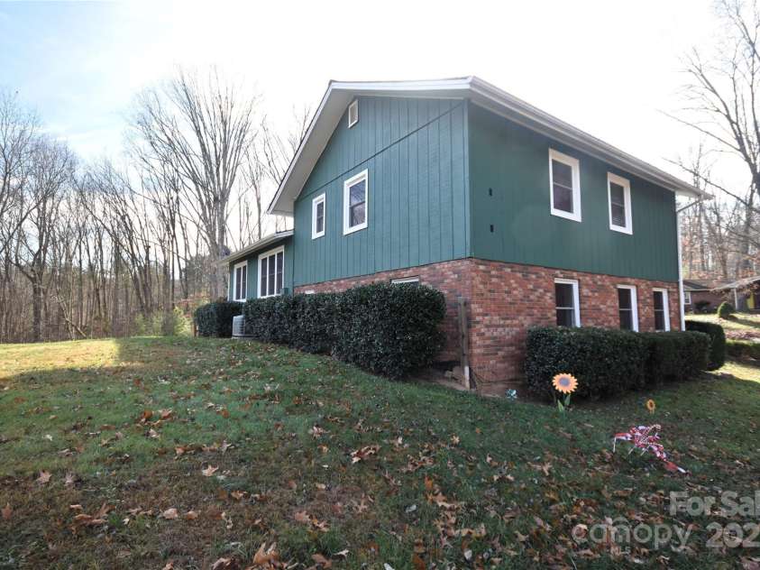 119 Pleasant Hill Circle, Waynesville, NC 28786.  MLS# CAR4325217, YatesRealty ID 506. Rear and side view of the home