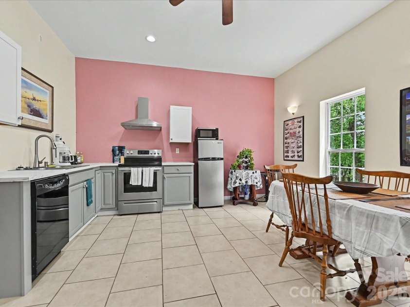 152 Lighthouse Road, Mount Holly, NC 28120.  MLS# CAR4389508, YatesRealty ID 5060. Basement apartment with small kitchen