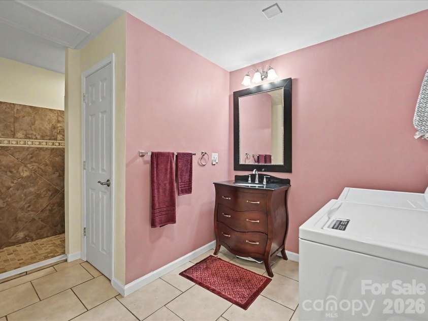 152 Lighthouse Road, Mount Holly, NC 28120.  MLS# CAR4389508, YatesRealty ID 5060. Basement level full bath also has laundry hookups