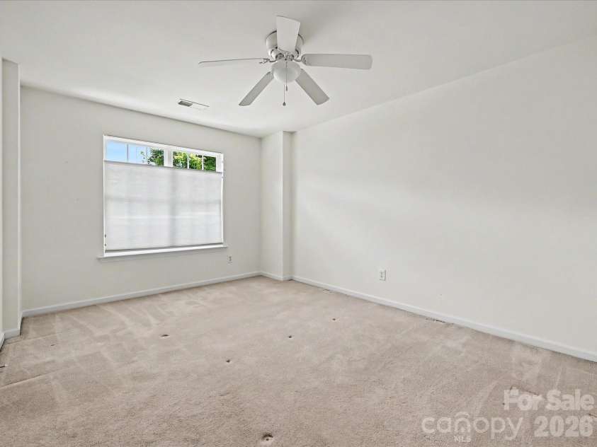 152 Lighthouse Road, Mount Holly, NC 28120.  MLS# CAR4389508, YatesRealty ID 5060. Bedroom 2 with ceiling fan