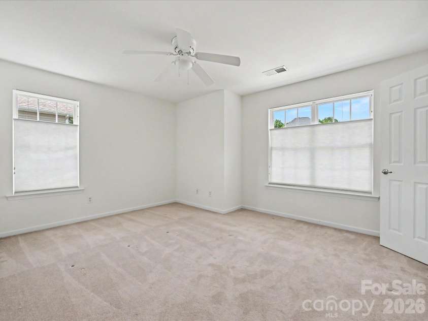 152 Lighthouse Road, Mount Holly, NC 28120.  MLS# CAR4389508, YatesRealty ID 5060. Bedroom 3 with ceiling fan