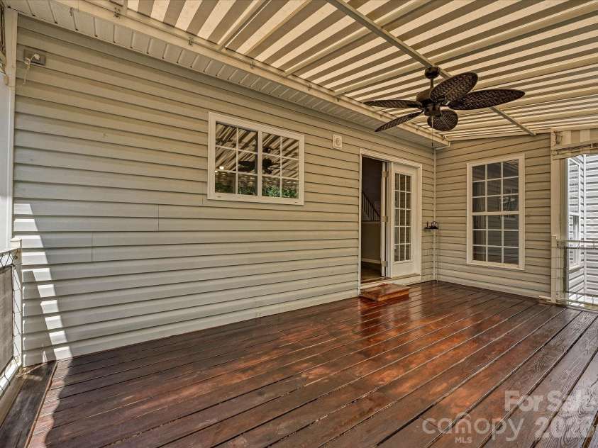 152 Lighthouse Road, Mount Holly, NC 28120.  MLS# CAR4389508, YatesRealty ID 5060. Deck with ceiling fan and hammock hooks