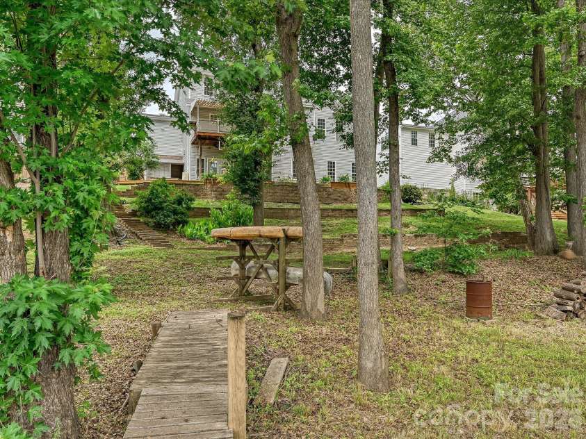 152 Lighthouse Road, Mount Holly, NC 28120.  MLS# CAR4389508, YatesRealty ID 5060. Wooded and natural setting