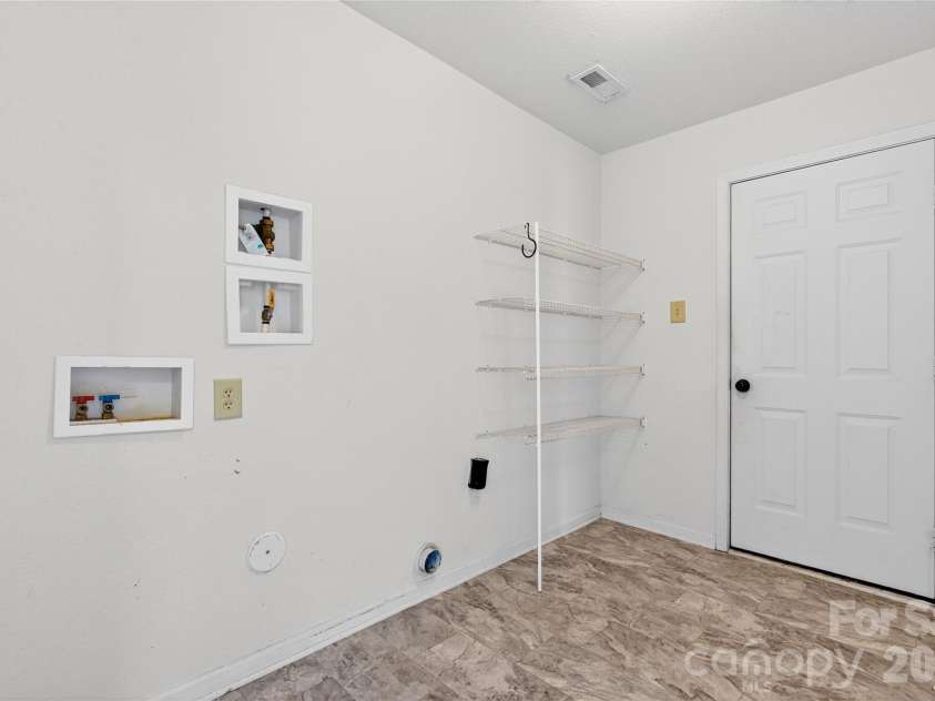 109 Bennett Trail Drive, Mount Holly, NC 28120.  MLS# CAR4424162, YatesRealty ID 50600. Laundry Room / Pantry