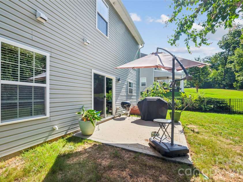 4901 Annelise Drive, Harrisburg, NC 28075.  MLS# CAR4424129, YatesRealty ID 50605. Back Patio
