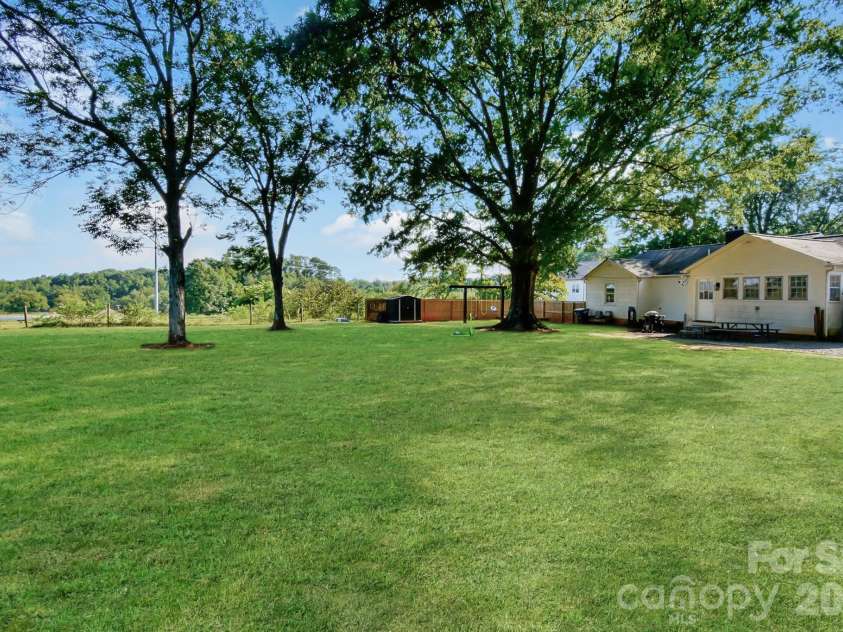 541 Perry Road, Troutman, NC 28166.  MLS# CAR4422089, YatesRealty ID 50609. Backyard views