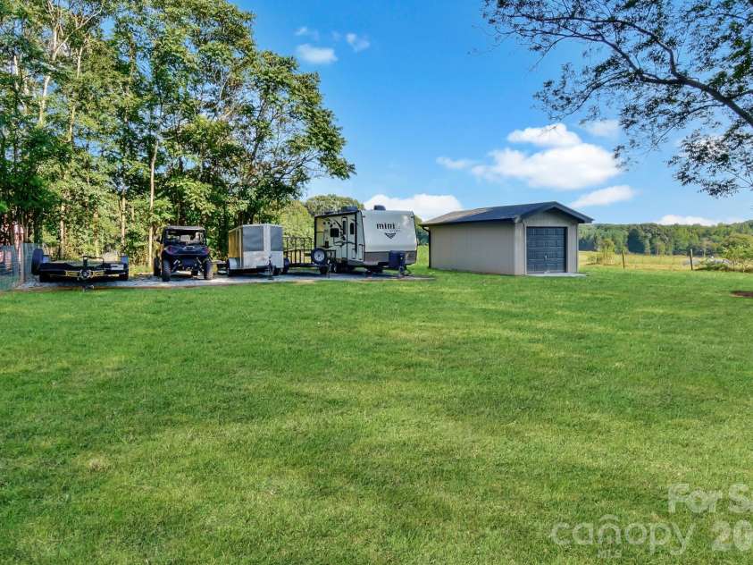 541 Perry Road, Troutman, NC 28166.  MLS# CAR4422089, YatesRealty ID 50609. Detached garage and trailer/camper parking
