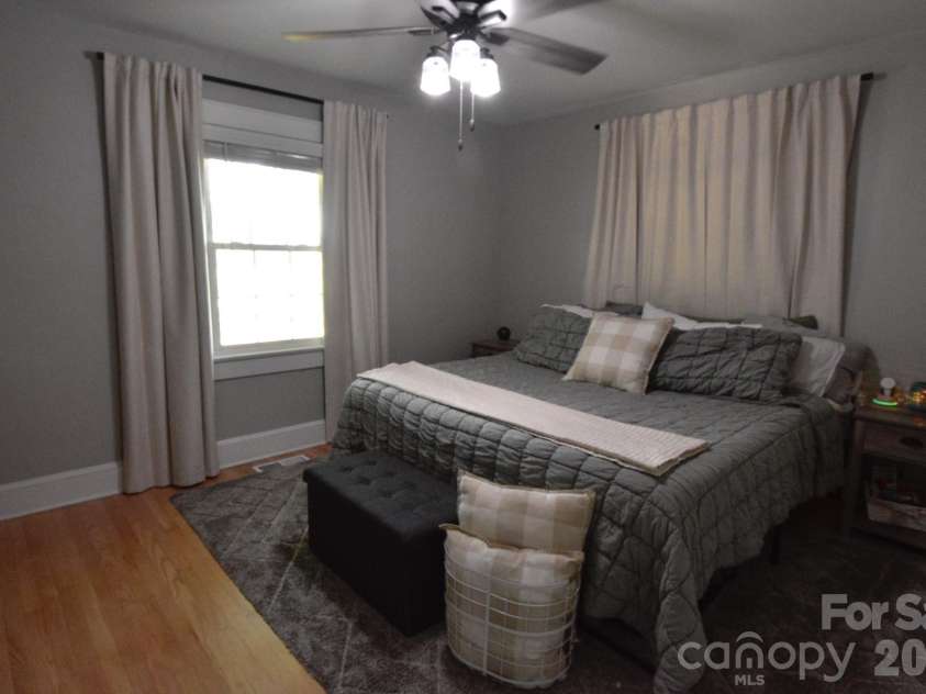 541 Perry Road, Troutman, NC 28166.  MLS# CAR4422089, YatesRealty ID 50609. Main level primary suite