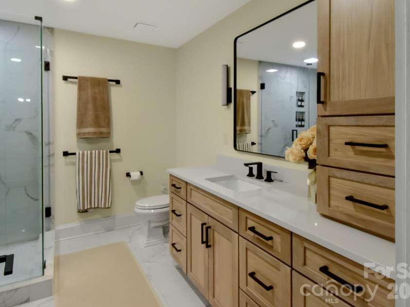 541 Perry Road, Troutman, NC 28166.  MLS# CAR4422089, YatesRealty ID 50609. Newly updated primary bathroom