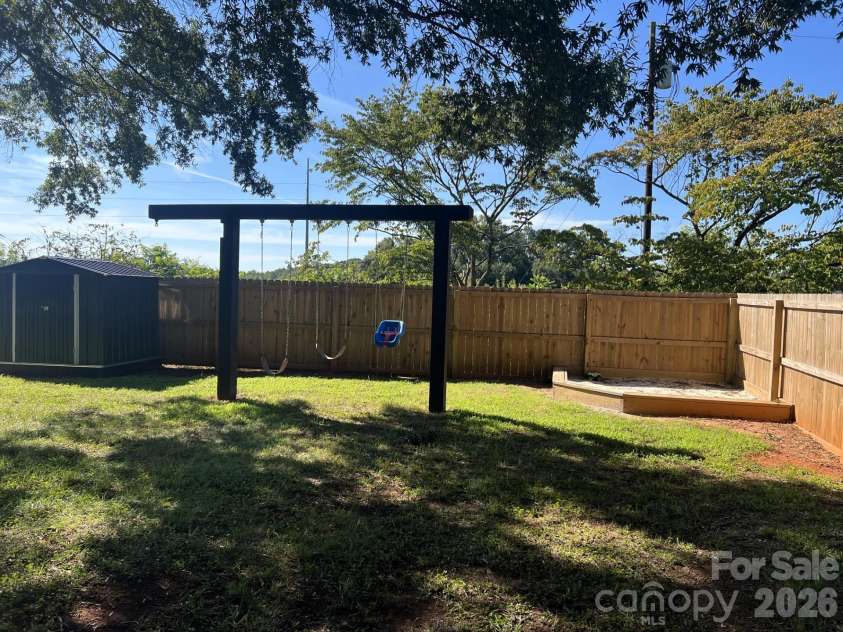 541 Perry Road, Troutman, NC 28166.  MLS# CAR4422089, YatesRealty ID 50609. Shed and playset to stay!