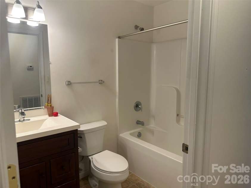 6 Kendrick Court, Flat Rock, NC 28731.  MLS# CAR4414981, YatesRealty ID 50622. 2nd bath with tub/shower combo