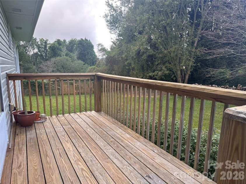 6 Kendrick Court, Flat Rock, NC 28731.  MLS# CAR4414981, YatesRealty ID 50622. Back deck 6x 12