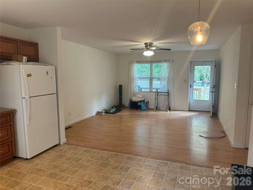 6 Kendrick Court, Flat Rock, NC 28731.  MLS# CAR4414981, YatesRealty ID 50622. Open concept living room and kitchen