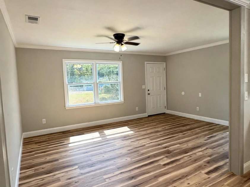 606 Creekridge Road, Monroe, NC 28110.  MLS# CAR4424158, YatesRealty ID 50633. Living Room
