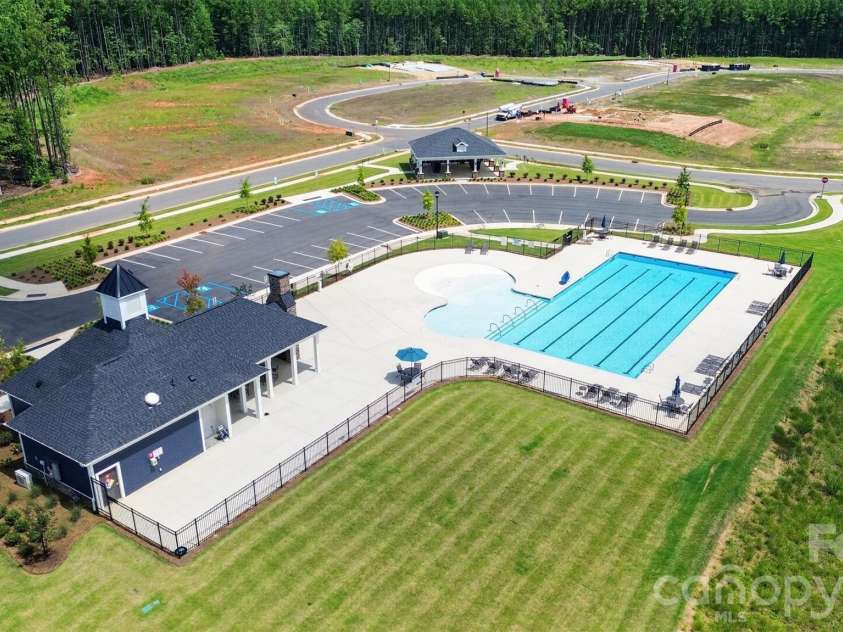 235 Supernova Drive, York, SC 29745.  MLS# CAR4417452, YatesRealty ID 50640. Community pool, cabana and playground area