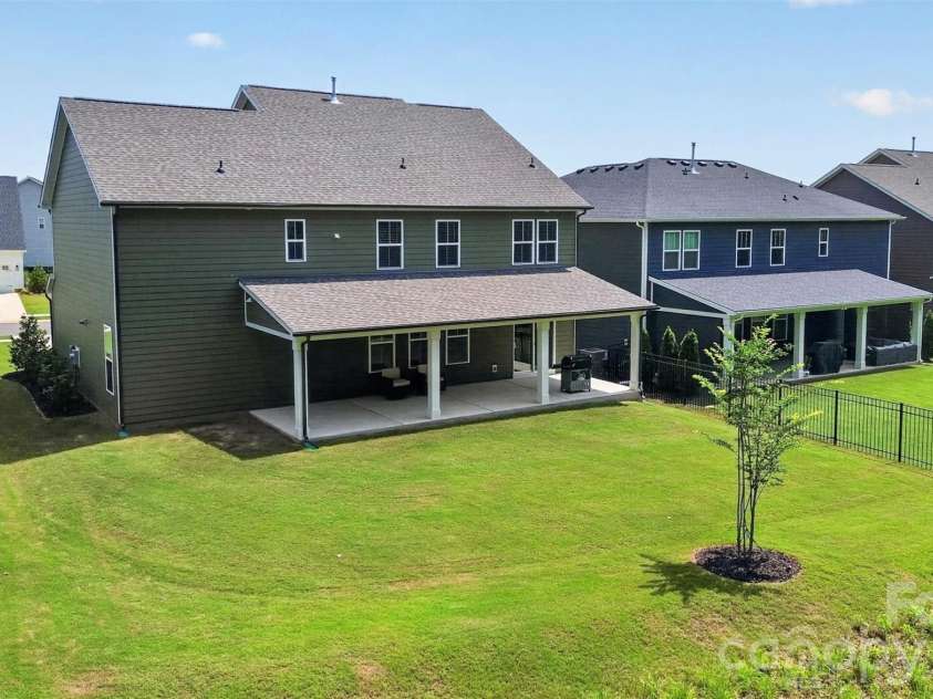 235 Supernova Drive, York, SC 29745.  MLS# CAR4417452, YatesRealty ID 50640. Level backyard