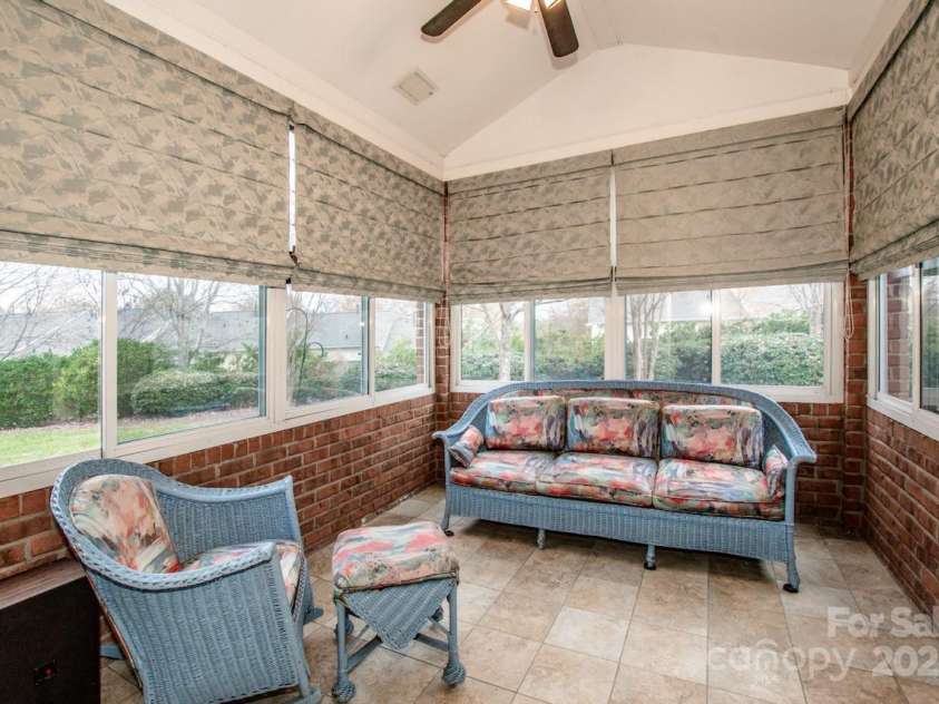 8320 Highland Glen Drive, Charlotte, NC 28269.  MLS# CAR4324740, YatesRealty ID 50643. Heated Sunroom provides extra square footage - one of largest units in Highland Glen