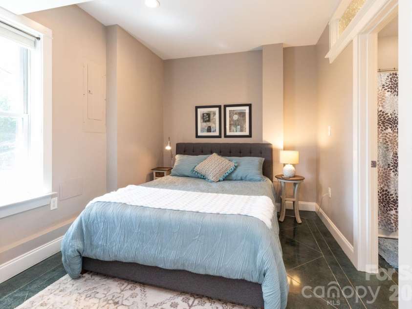278 Brevard Road, Asheville, NC 28806.  MLS# CAR4408932, YatesRealty ID 50646. Lower Level Bedroom