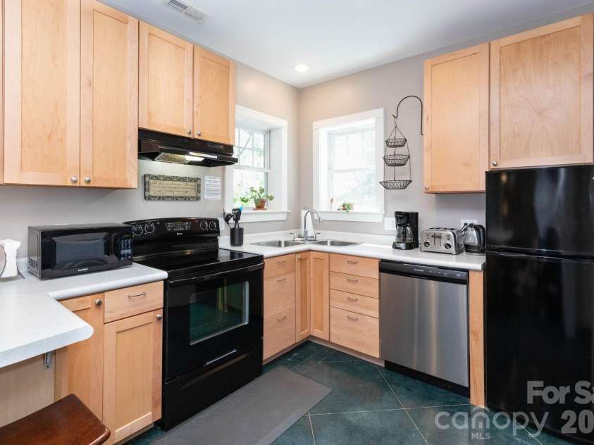 278 Brevard Road, Asheville, NC 28806.  MLS# CAR4408932, YatesRealty ID 50646. Lower Level Kitchen