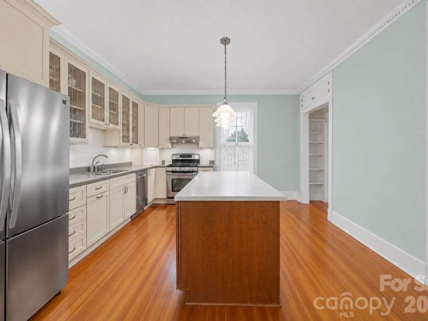 229 Race Street, Statesville, NC 28677.  MLS# CAR4355545, YatesRealty ID 5065. Virtually Empty Kitchen