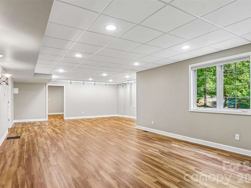 361 Mills River Way, Horse Shoe, NC 28742.  MLS# CAR4423037, YatesRealty ID 50654. Basement bedroom with nice views