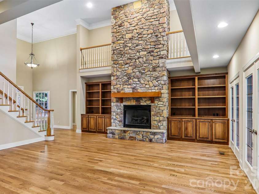 361 Mills River Way, Horse Shoe, NC 28742.  MLS# CAR4423037, YatesRealty ID 50654. Great room accesses the upper level covered deck
