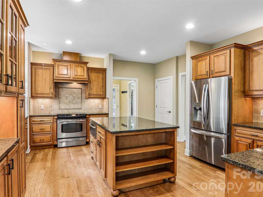 361 Mills River Way, Horse Shoe, NC 28742.  MLS# CAR4423037, YatesRealty ID 50654. Kitchen features a breakfast bar and island