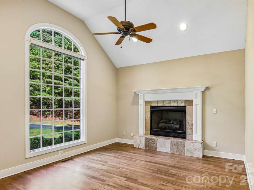 361 Mills River Way, Horse Shoe, NC 28742.  MLS# CAR4423037, YatesRealty ID 50654. Study/office on main level with gas fireplace