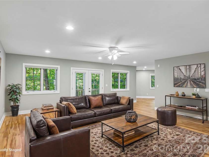 361 Mills River Way, Horse Shoe, NC 28742.  MLS# CAR4423037, YatesRealty ID 50654. Virtually staged basement living area