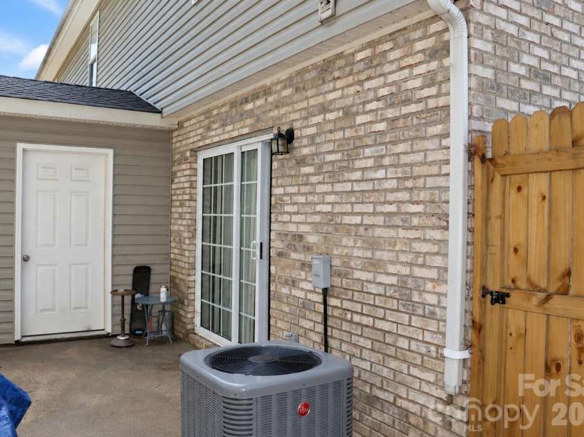 102 King Henry Lane, Granite Falls, NC 28630.  MLS# CAR4411677, YatesRealty ID 50657. Unit 102 Patio