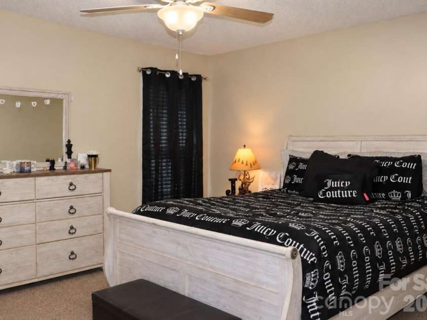 102 King Henry Lane, Granite Falls, NC 28630.  MLS# CAR4411677, YatesRealty ID 50657. Unit 116 Primary Bedroom