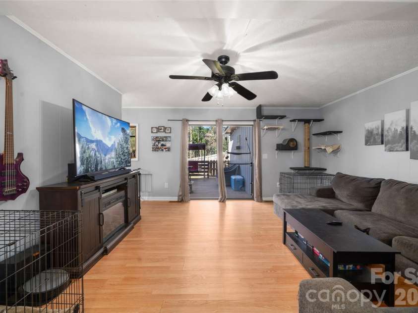 177 Forest Drive, Clyde, NC 28721.  MLS# CAR4424243, YatesRealty ID 50661. Living Room Wider View