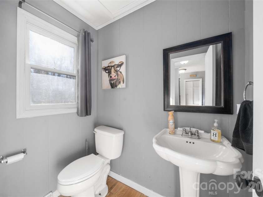177 Forest Drive, Clyde, NC 28721.  MLS# CAR4424243, YatesRealty ID 50661. Main Level Half Bath