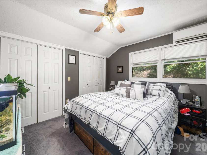177 Forest Drive, Clyde, NC 28721.  MLS# CAR4424243, YatesRealty ID 50661. Upper Level Primary Bedroom