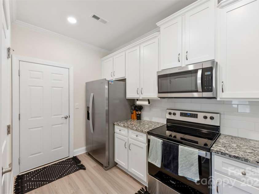 128 Sina Street, Troutman, NC 28166.  MLS# CAR4318732, YatesRealty ID 50674. Kitchen