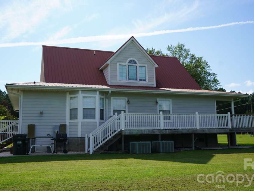 1244 Ross Wright Road, Polkton, NC 28135.  MLS# CAR4421614, YatesRealty ID 50698. Back View of home