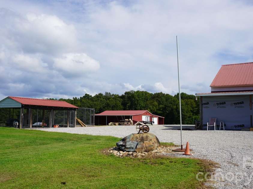 1244 Ross Wright Road, Polkton, NC 28135.  MLS# CAR4421614, YatesRealty ID 50698. Huge dog kennel stays